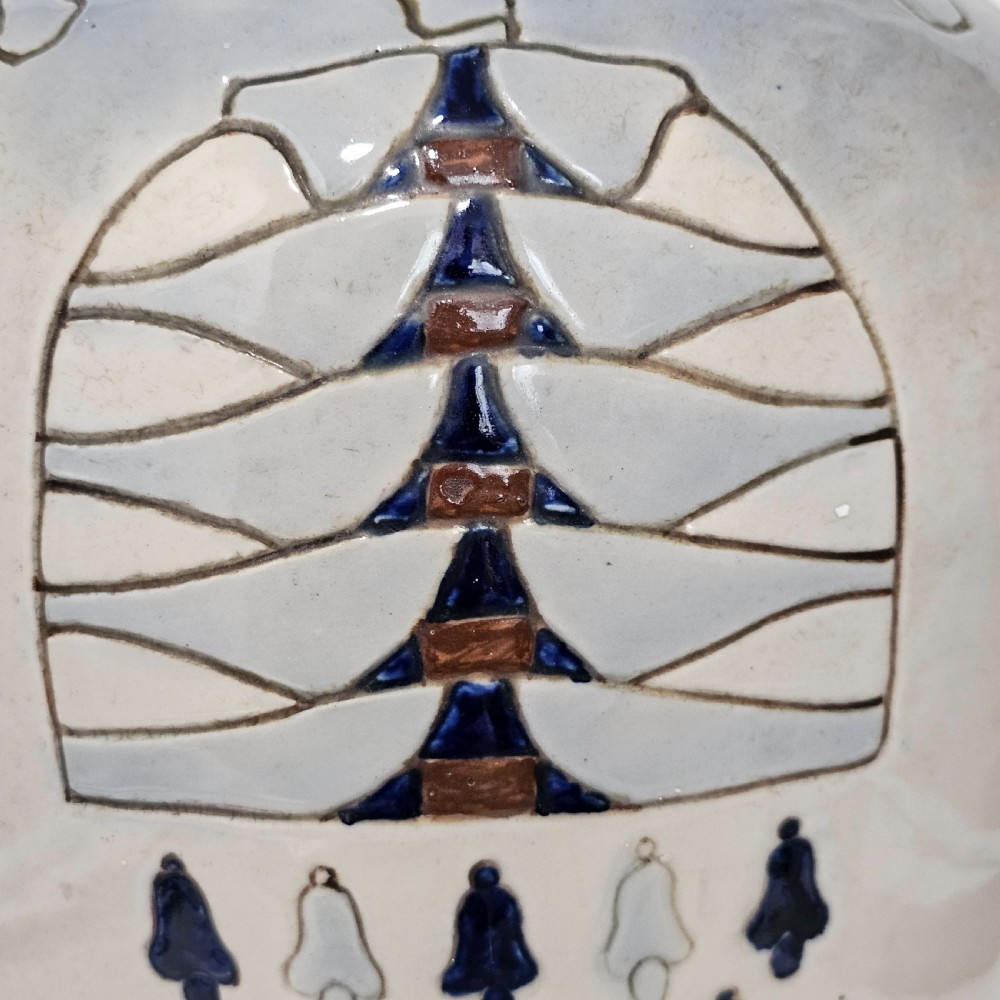 A twin-handled cream ceramic Amphora vase decorated with a stylized bird motif in blue and dark glazes. View VIII