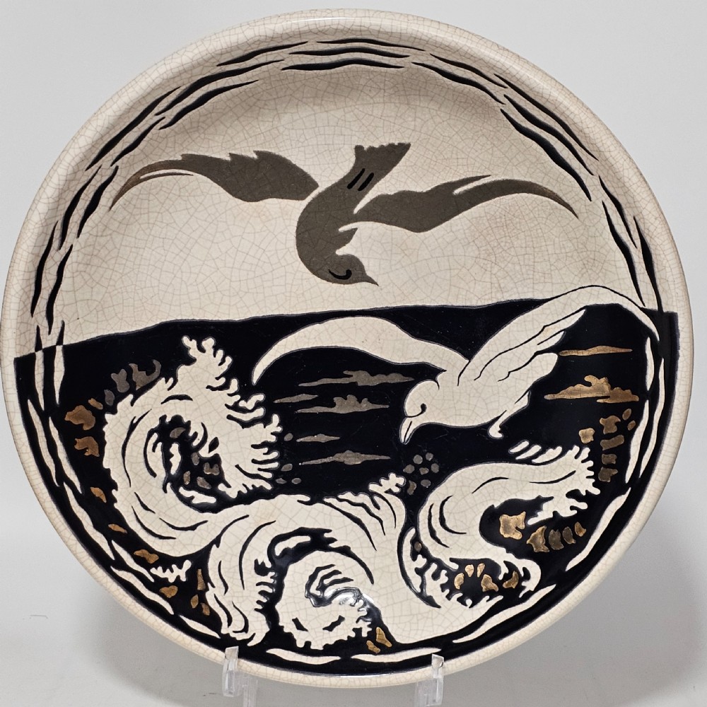 A Large Longwy Primavera art deco charger decorated with seagulls