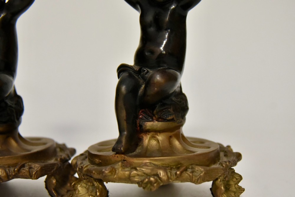 Attractive Pair of Bronze & Brass Cherub Candlesticks, circa 1900
 View VII