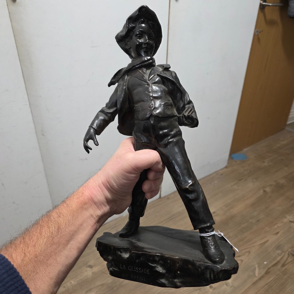 Antoine Bofill (Spanish, 1875-1939), 'La Glissade', 37cm bronze figure of a boy sliding on ice View VII
