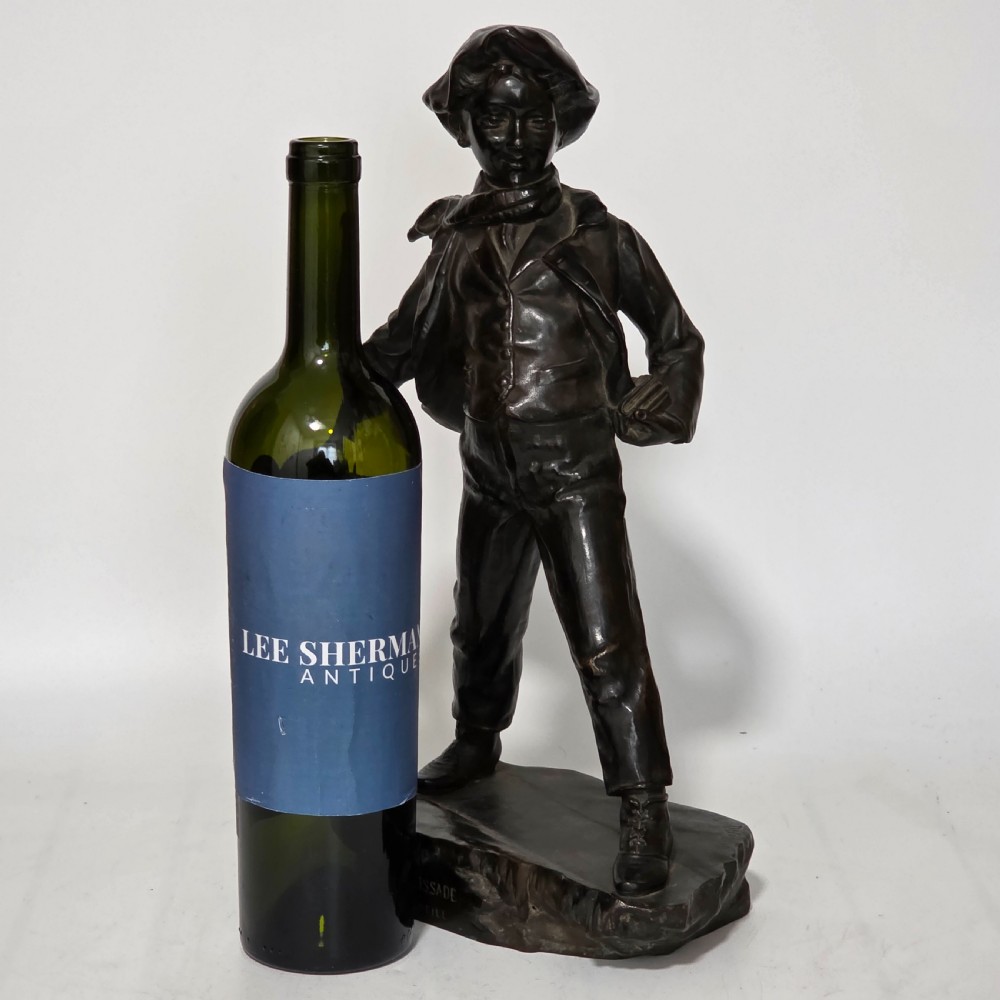 Antoine Bofill (Spanish, 1875-1939), 'La Glissade', 37cm bronze figure of a boy sliding on ice View III
