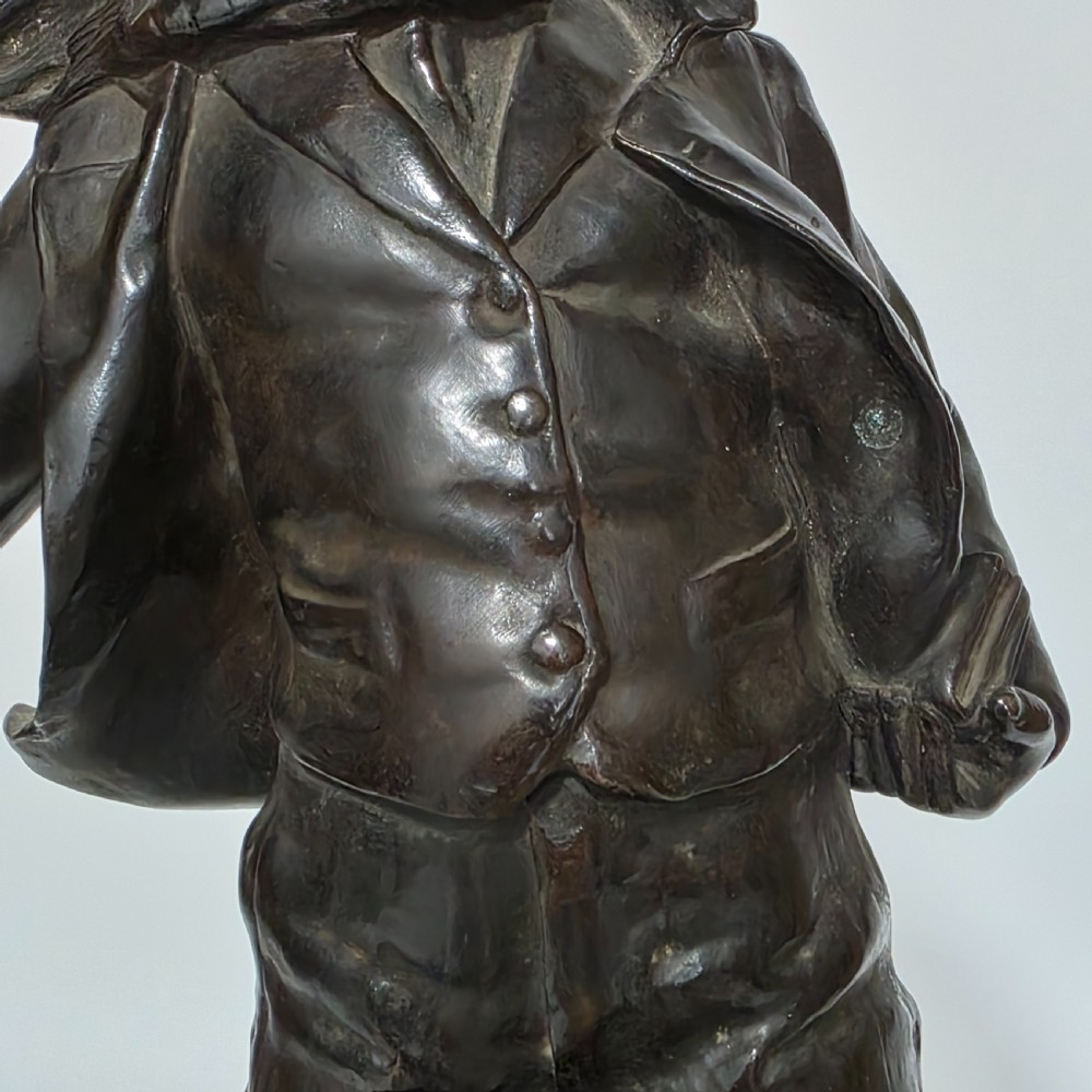 Antoine Bofill (Spanish, 1875-1939), 'La Glissade', 37cm bronze figure of a boy sliding on ice View VI