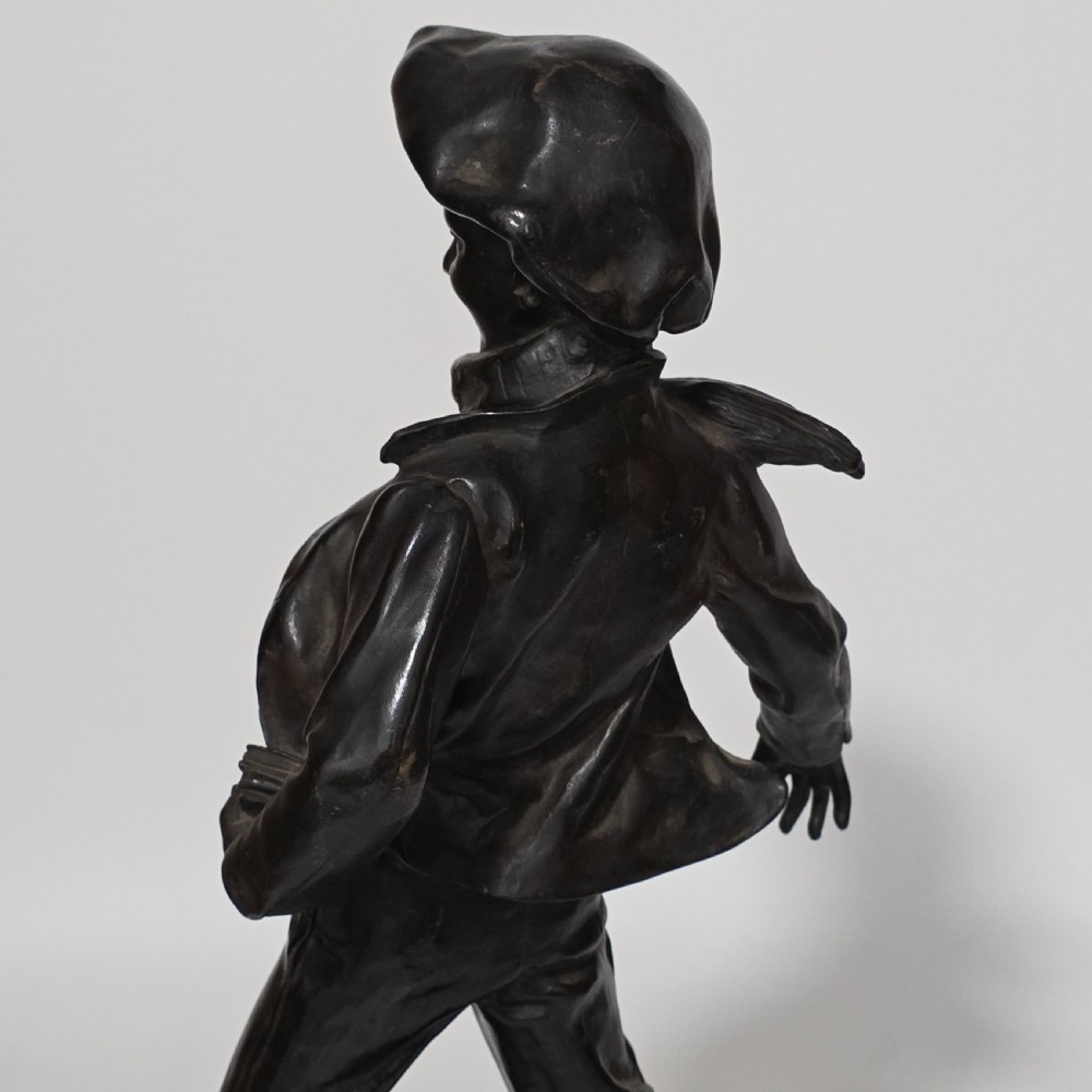 Antoine Bofill (Spanish, 1875-1939), 'La Glissade', 37cm bronze figure of a boy sliding on ice View XIII