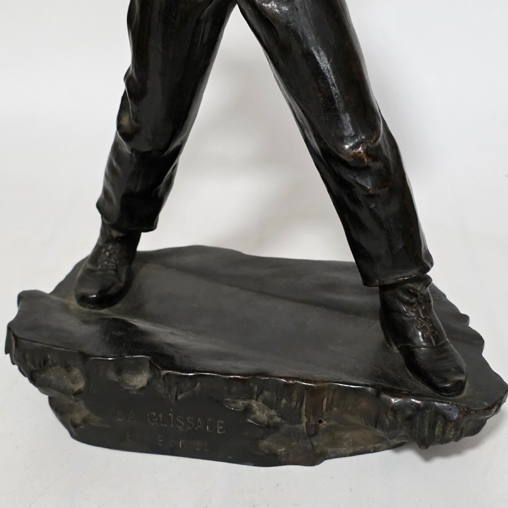Antoine Bofill (Spanish, 1875-1939), 'La Glissade', 37cm bronze figure of a boy sliding on ice View XXI