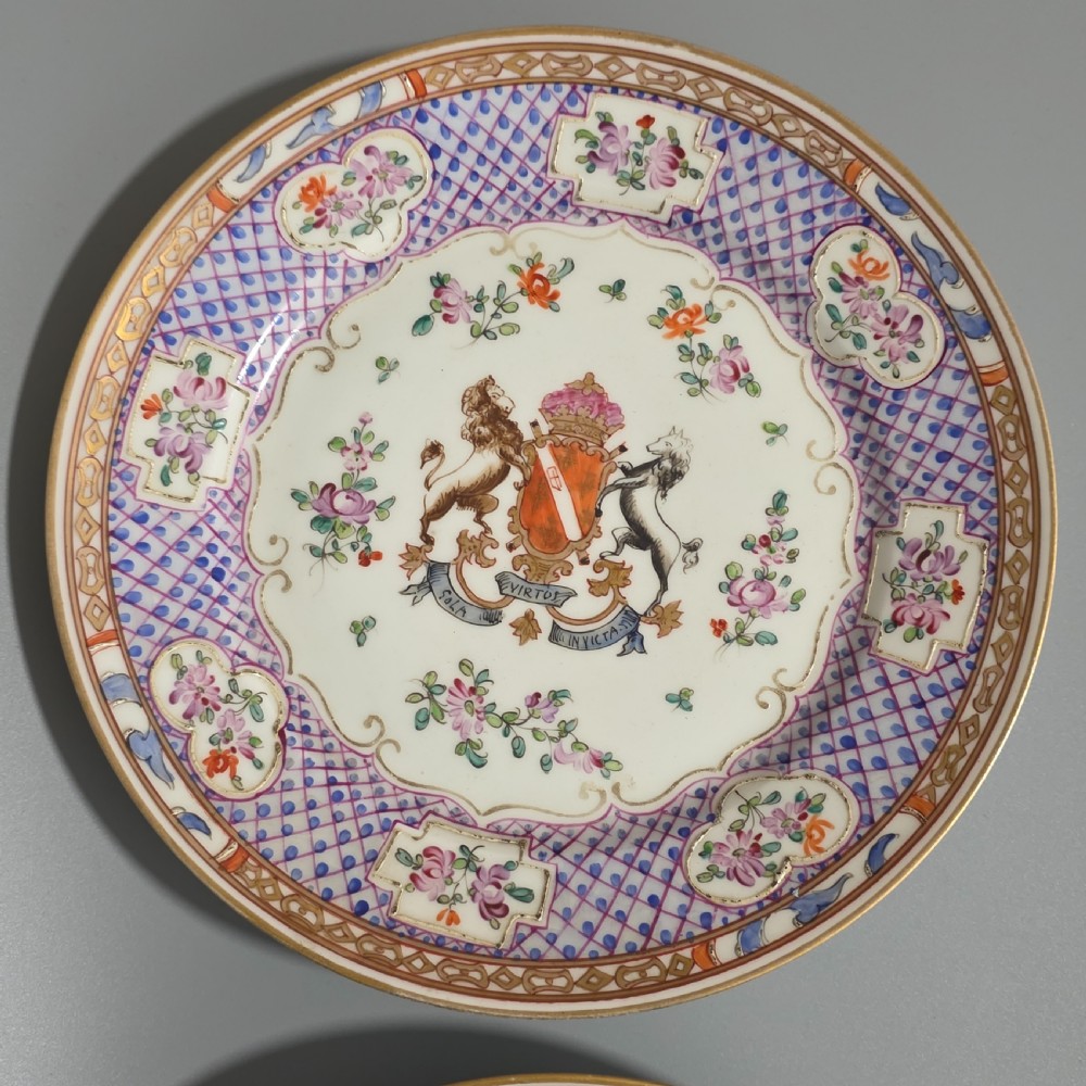 A pair of nineteenth-century Samson porcelain cabinet plates featuring hand-painted coat of arms crests surrounded by floral sprays and purple lattice borders. View III