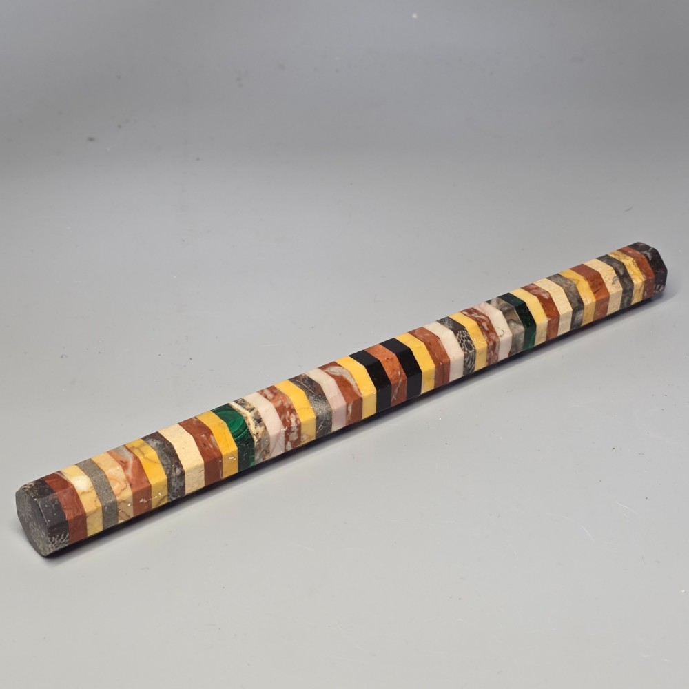 An antique octagonal ruler constructed from alternating segments of multi-coloured specimen marbles, agate, and malachite. View IV