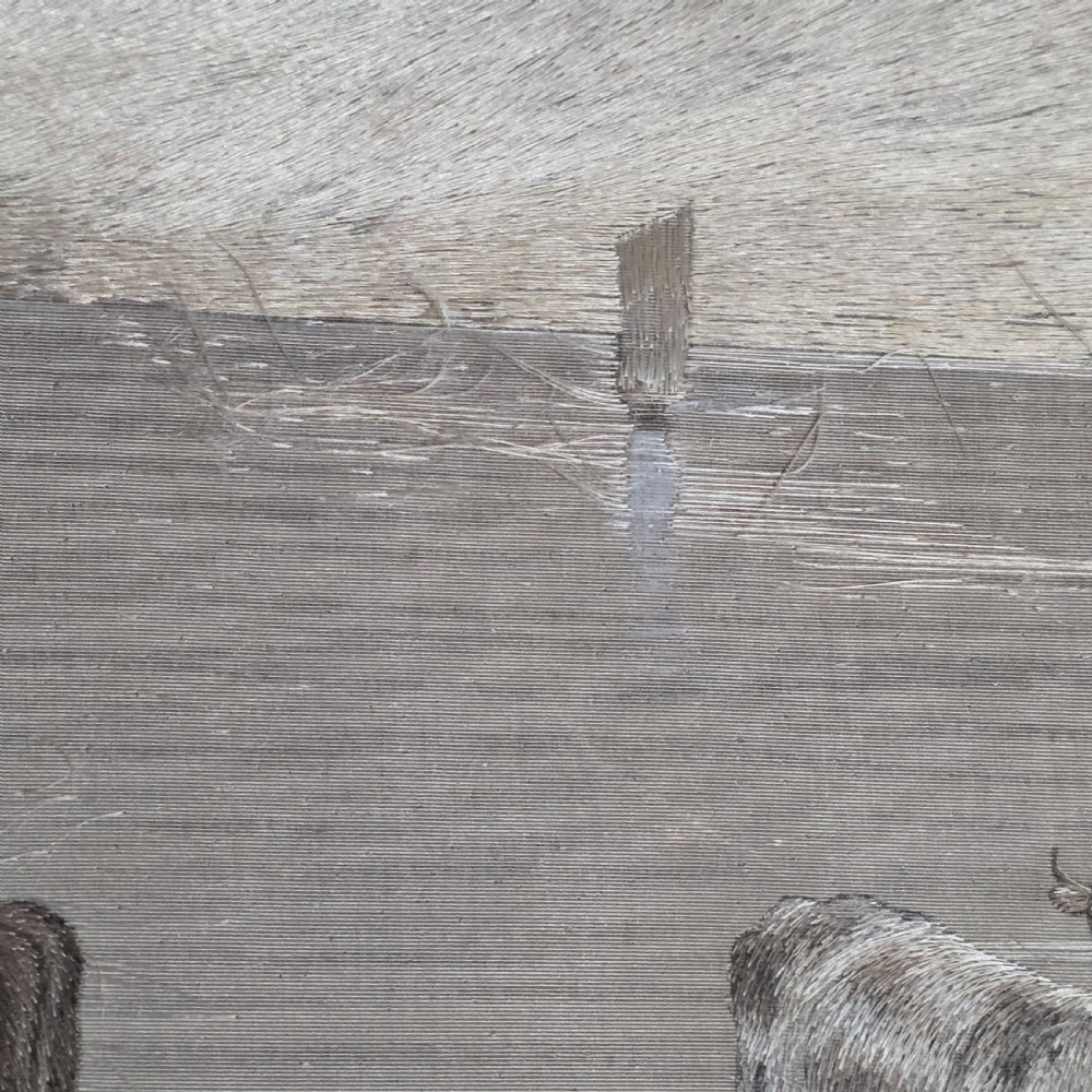 A framed Chinese silk embroidery panel depicting cattle standing in water in front of a mountainous background, presented in a wide oak frame. View XII