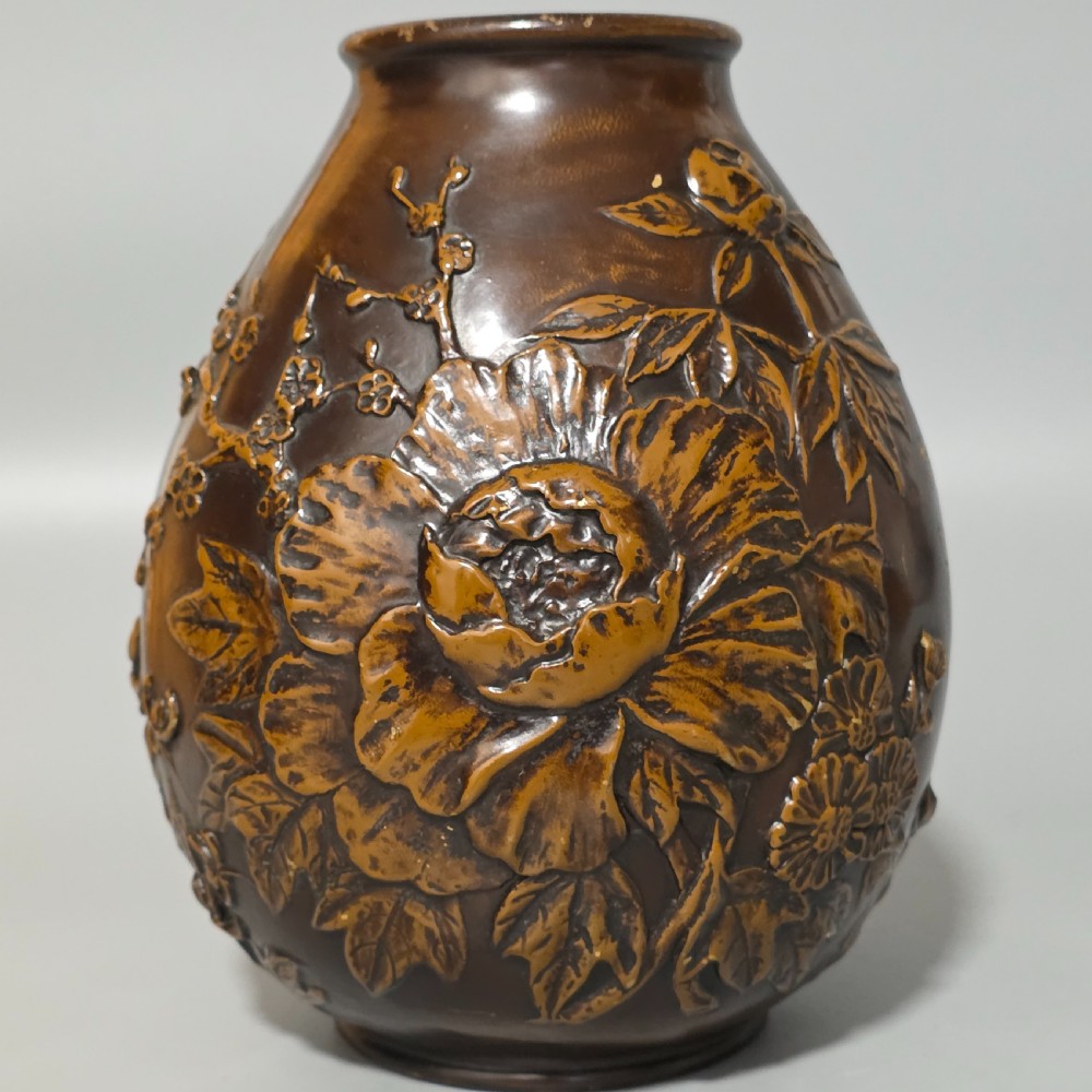 A dark brown patinated bronze vase featuring raised high-relief floral carvings of large peonies and chrysanthemums. View XIII
