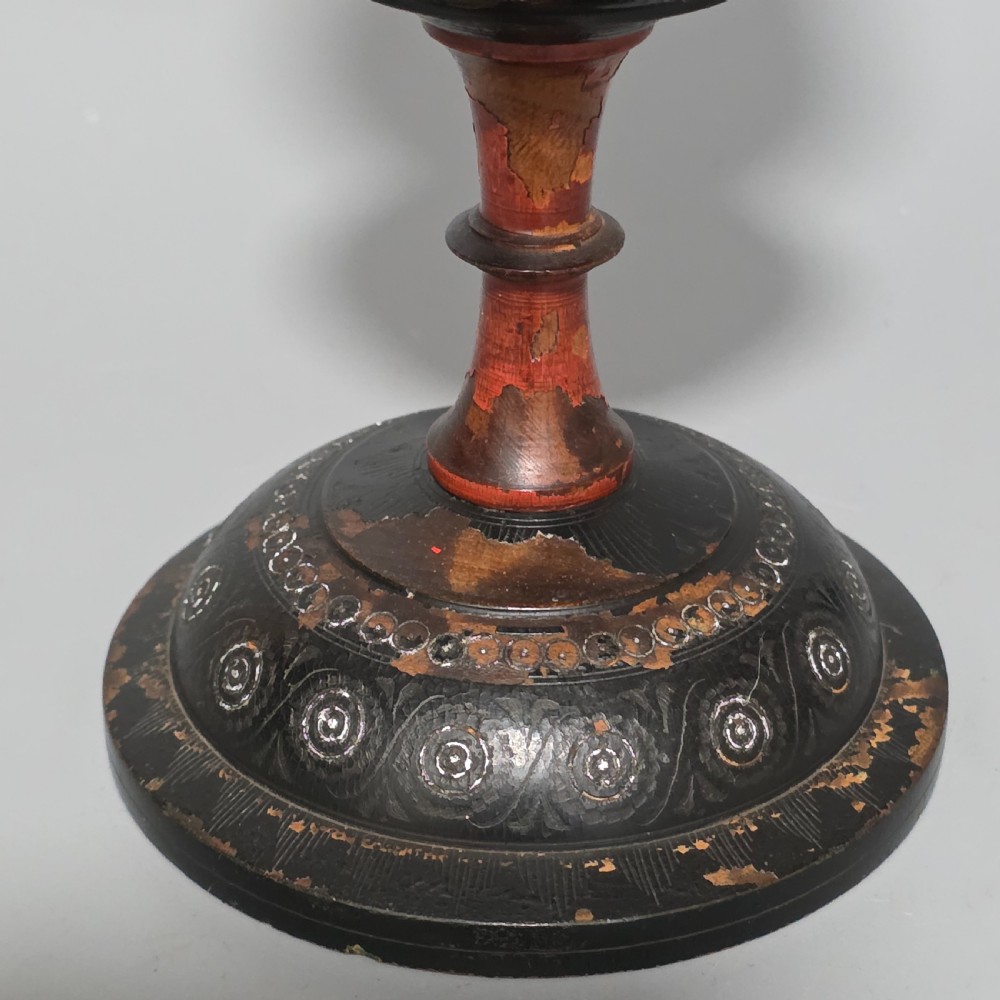 A tall 19th-century lacquered tapering vase with intricate incised geometric motifs on a turned pedestal stem. View III