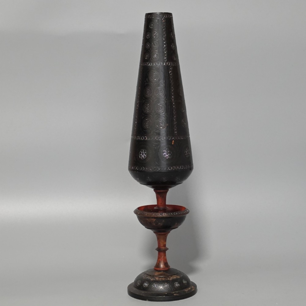 A tall 19th-century lacquered tapering vase with intricate incised geometric motifs on a turned pedestal stem. View VIII