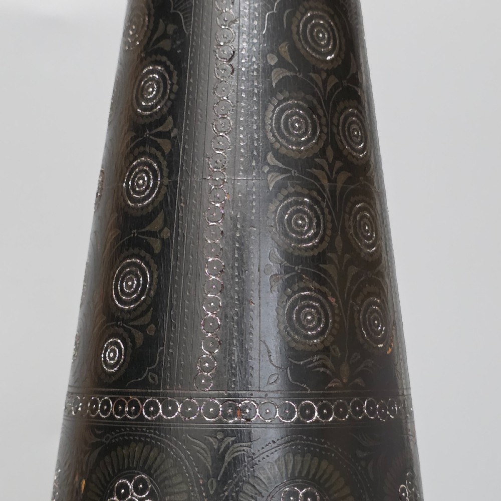 A tall 19th-century lacquered tapering vase with intricate incised geometric motifs on a turned pedestal stem. View XI