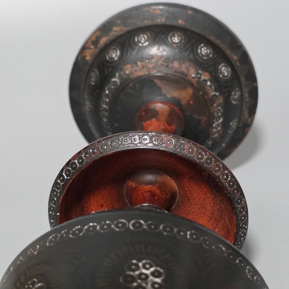 A tall 19th-century lacquered tapering vase with intricate incised geometric motifs on a turned pedestal stem. View XII