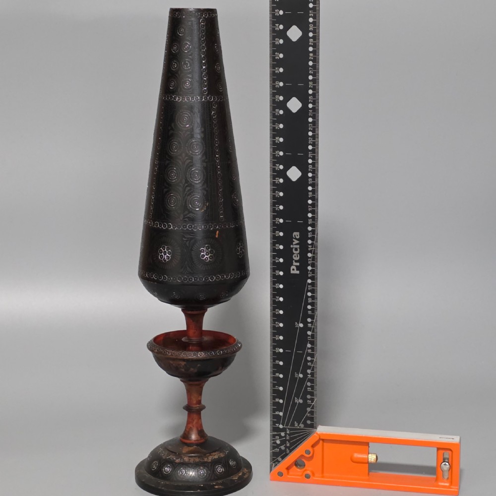 A tall 19th-century lacquered tapering vase with intricate incised geometric motifs on a turned pedestal stem. View XVI
