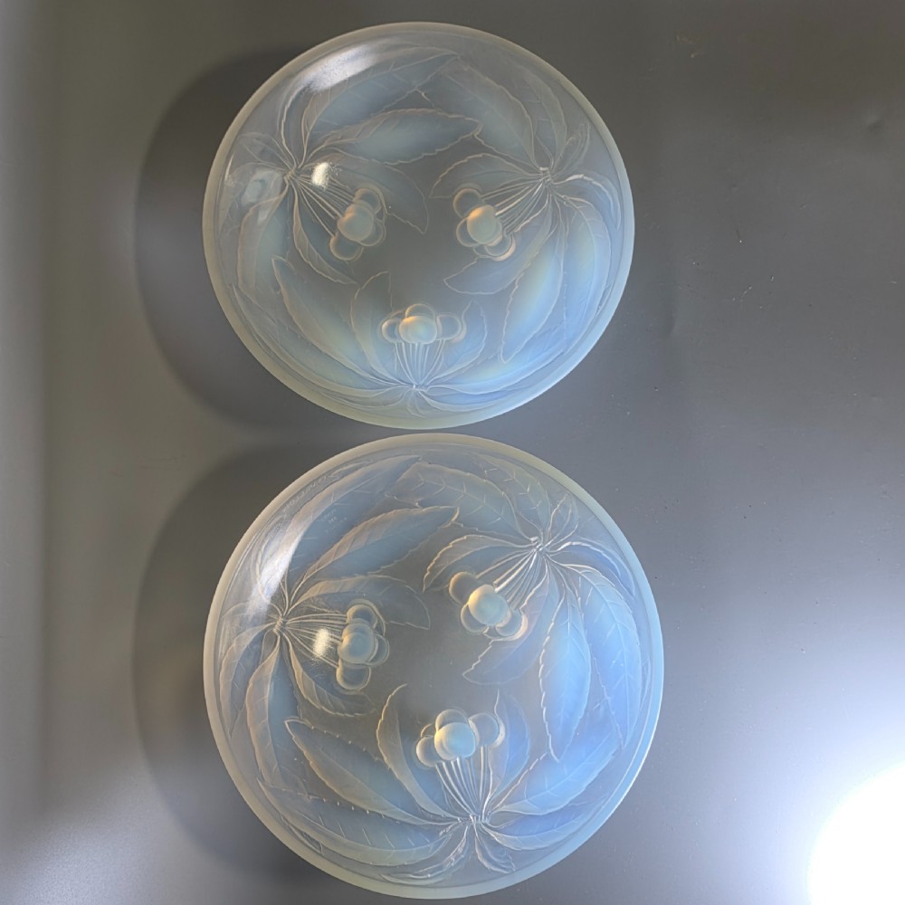 A pair of round 1930s French opalescent glass bowls featuring a moulded cherry and leaf design. View II