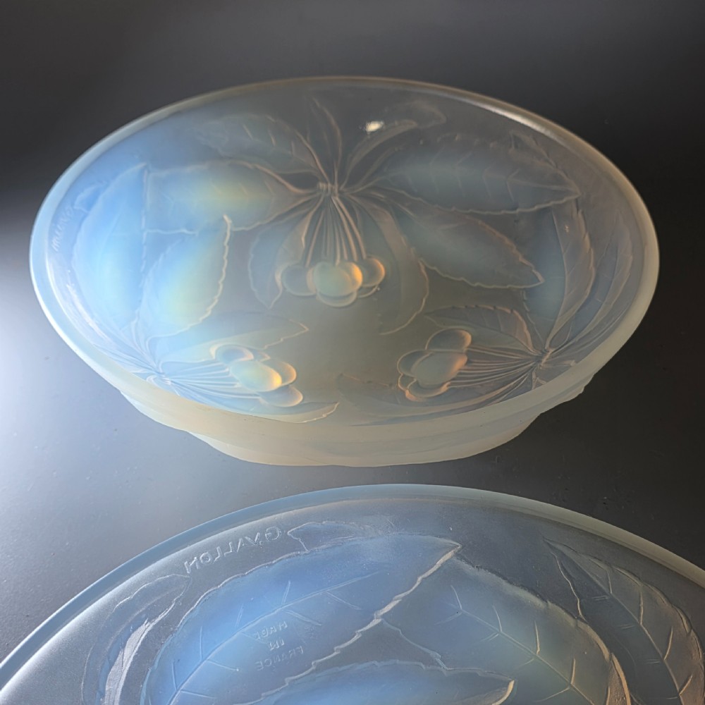 A pair of round 1930s French opalescent glass bowls featuring a moulded cherry and leaf design. View XVI