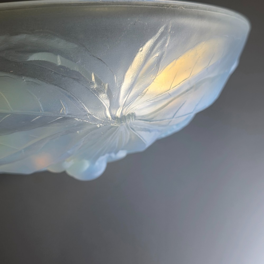 A pair of round 1930s French opalescent glass bowls featuring a moulded cherry and leaf design. View XVIII