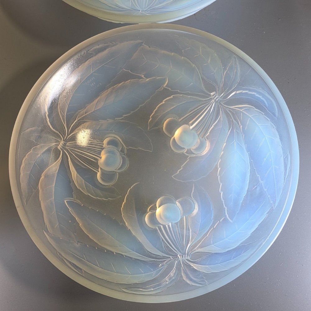A pair of round 1930s French opalescent glass bowls featuring a moulded cherry and leaf design. View XIX