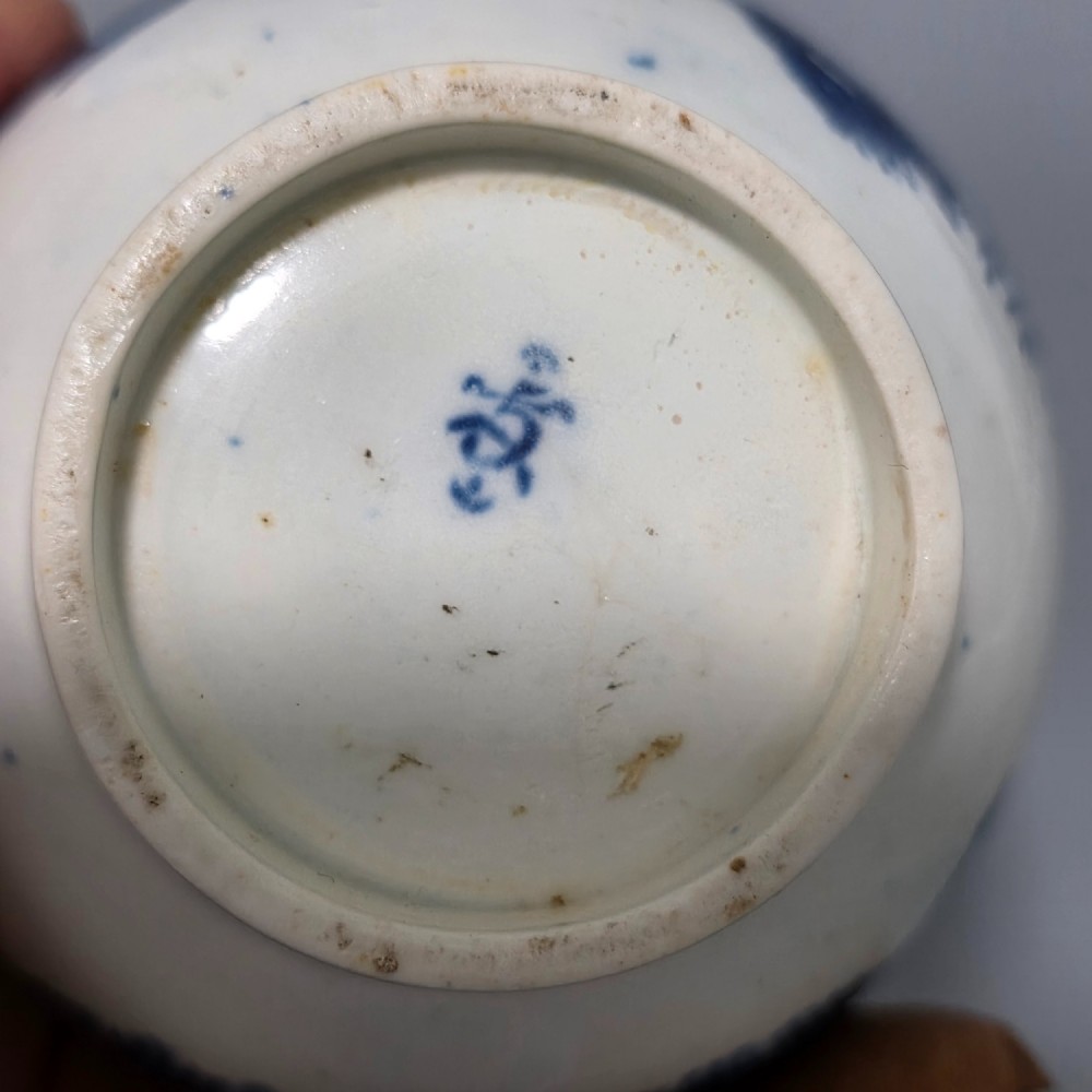 An 18th-century Worcester First Period soft-paste porcelain sparrow beak jug with cover, featuring a blue and white chinoiserie pattern and gilded rims. View IX