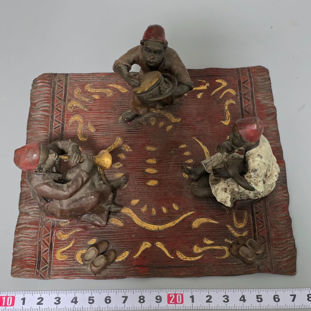 Franz Bergman (Austrian, 1861-1936) An Orientalist cold painted bronze group depicting three musicians on a rug Stamped 'Namgreb and B' and numbered '7813' View II