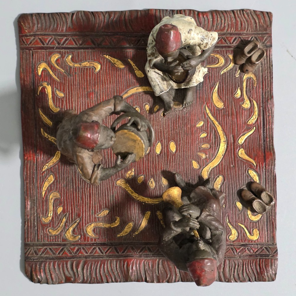 Franz Bergman (Austrian, 1861-1936) An Orientalist cold painted bronze group depicting three musicians on a rug Stamped 'Namgreb and B' and numbered '7813' View XI