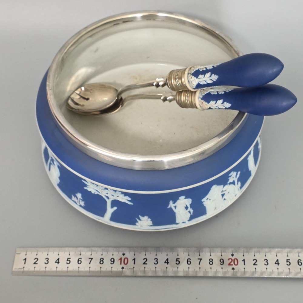 A Victorian Wedgwood blue jasperware salad bowl with a silver-plated rim, decorated with white neoclassical relief figures, complete with matching blue and silver servers. View III