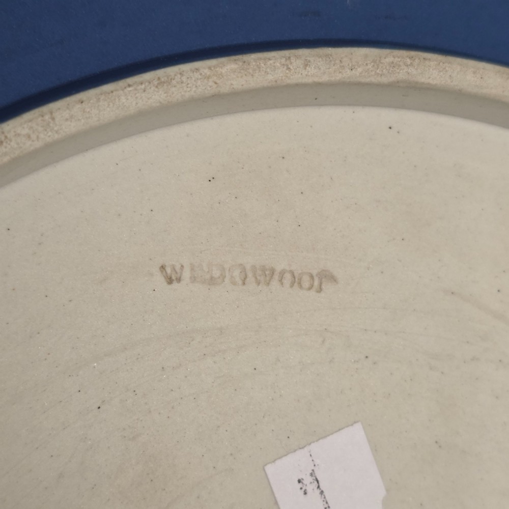 A Victorian Wedgwood blue jasperware salad bowl with a silver-plated rim, decorated with white neoclassical relief figures, complete with matching blue and silver servers. View VI
