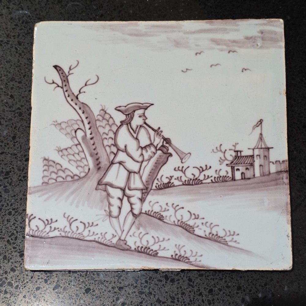 18th Century Liverpool Delft Manganese Tile Man Playing a Flute