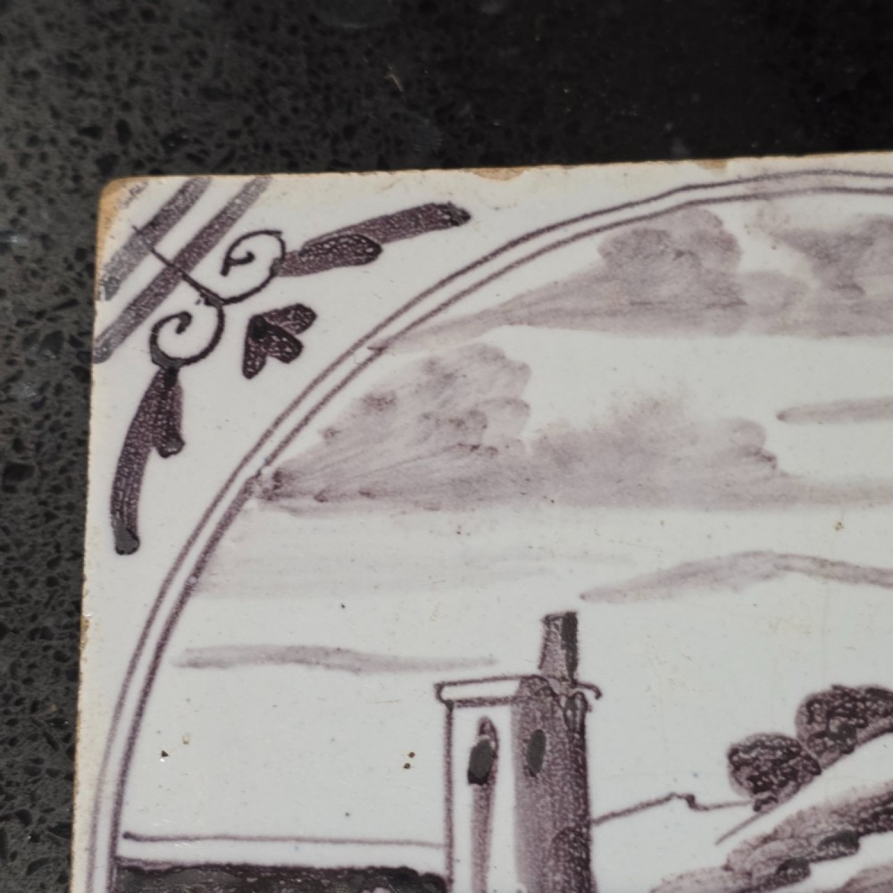 London delft tile painted in manganese with a man fishing in a river, circa 1725 - 1760 View III