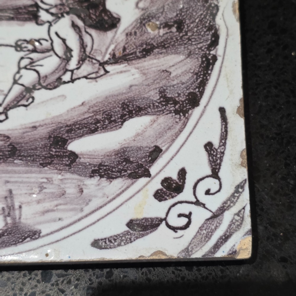 London delft tile painted in manganese with a man fishing in a river, circa 1725 - 1760 View V