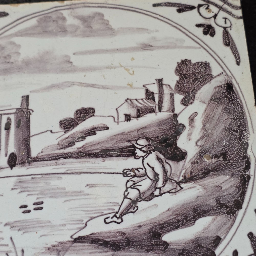 London delft tile painted in manganese with a man fishing in a river, circa 1725 - 1760 View VII