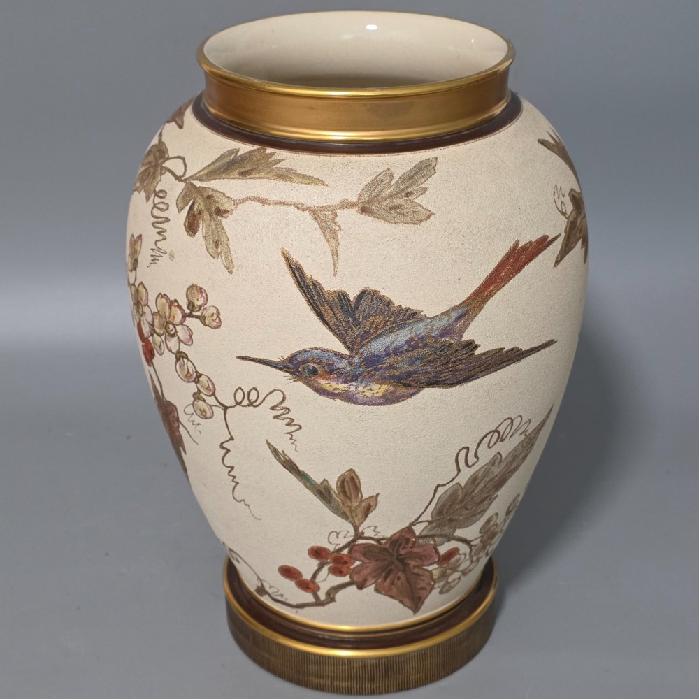 A large cream ceramic vase adorned with hand-painted botanical vines, foliage, berries, and gilded accents. View XI