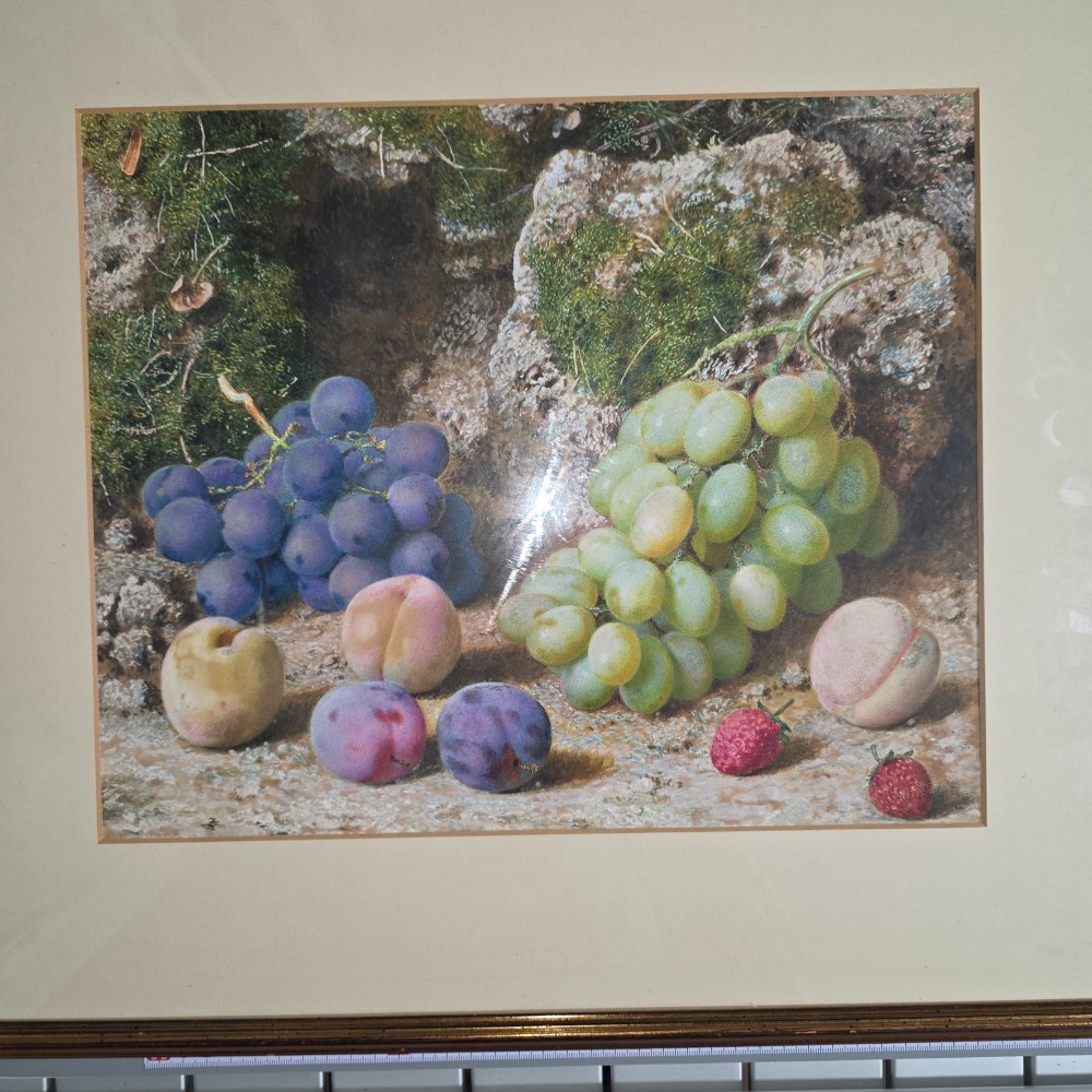 A framed 19th-century watercolour painting by John Sherrin depicting green and purple grapes, plums, and strawberries set against a mossy stone backdrop. View II