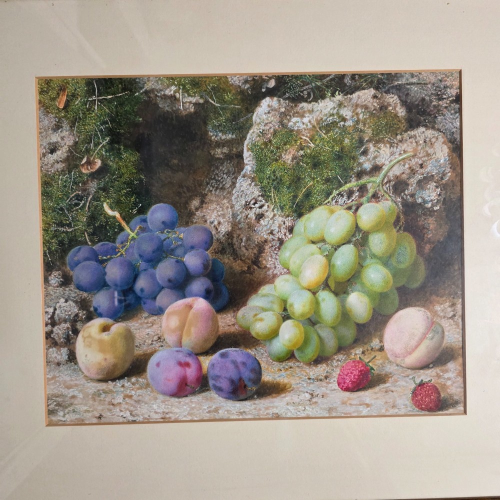A framed 19th-century watercolour painting by John Sherrin depicting green and purple grapes, plums, and strawberries set against a mossy stone backdrop. View III