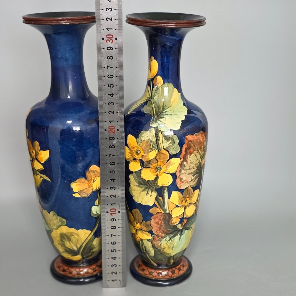 A pair of Doulton Lambeth faience vases, late 19th Century, decorated by Alberta L. Green View XII