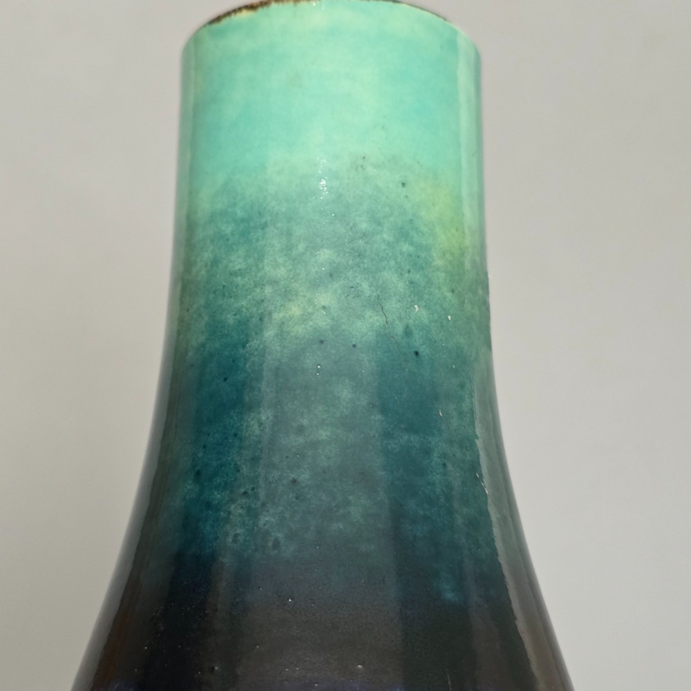 A late Victorian double-gourd earthenware vase with hand-painted fruit roundels, stylized floral bands, and a gradient turquoise to blue neck. View VII