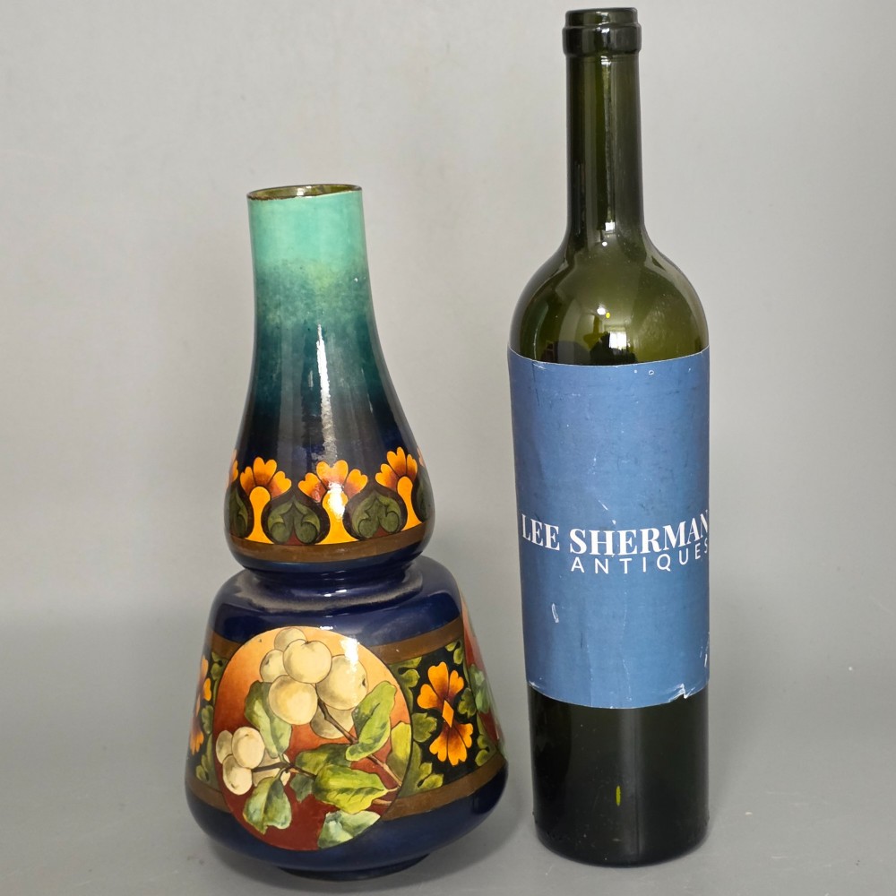 A late Victorian double-gourd earthenware vase with hand-painted fruit roundels, stylized floral bands, and a gradient turquoise to blue neck. View XI