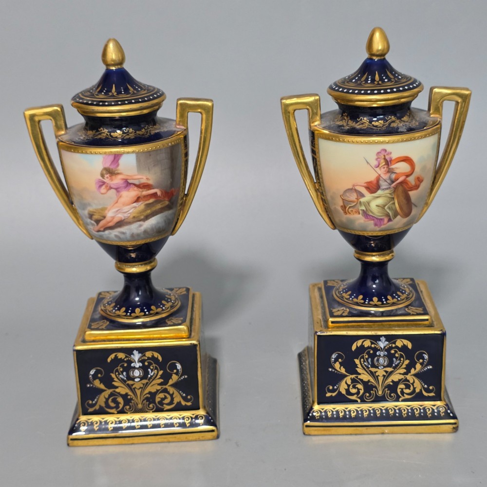 A pair of cobalt blue and gold Vienna porcelain Empire amphora vases featuring hand-painted classical figures and square plinth bases. View III