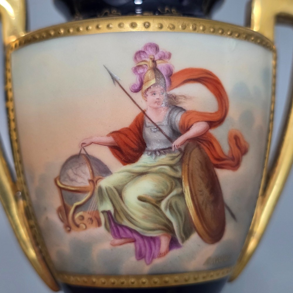 A pair of cobalt blue and gold Vienna porcelain Empire amphora vases featuring hand-painted classical figures and square plinth bases. View IV