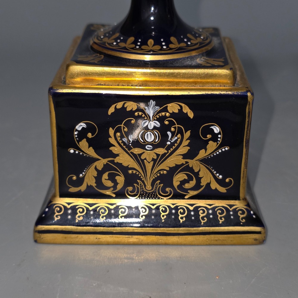 A pair of cobalt blue and gold Vienna porcelain Empire amphora vases featuring hand-painted classical figures and square plinth bases. View XI