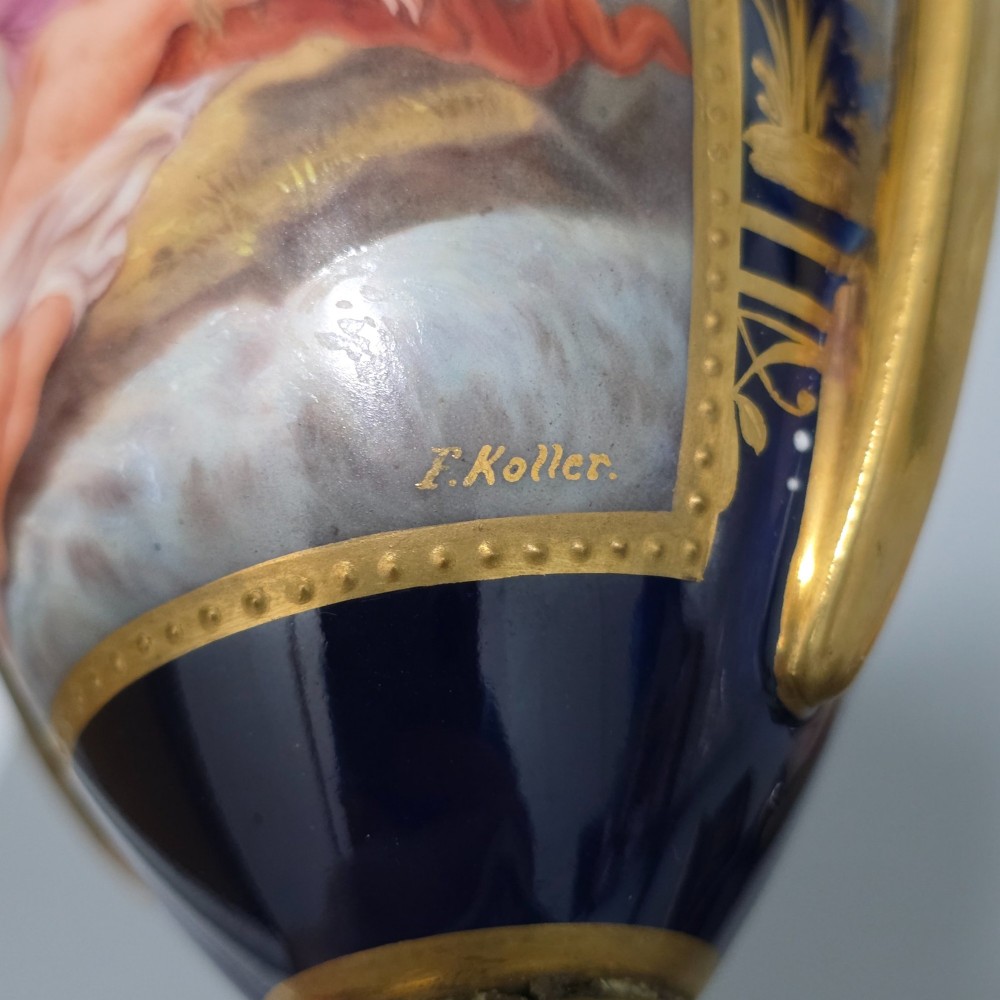 A pair of cobalt blue and gold Vienna porcelain Empire amphora vases featuring hand-painted classical figures and square plinth bases. View XIII