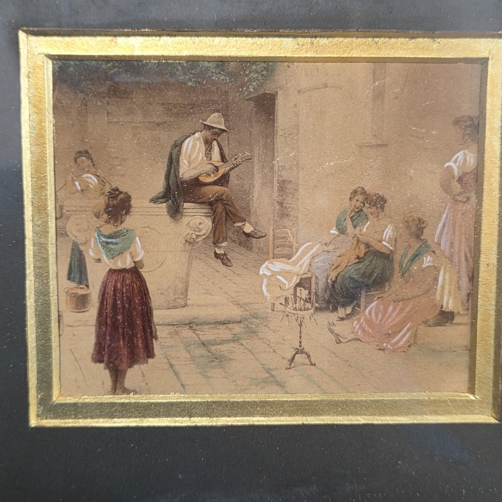 A pair of rectangular antique gilt-framed pictures featuring figurative genre scenes set against dark matting. View XII