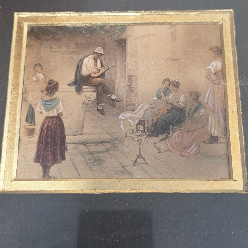 A pair of rectangular antique gilt-framed pictures featuring figurative genre scenes set against dark matting. View XIV