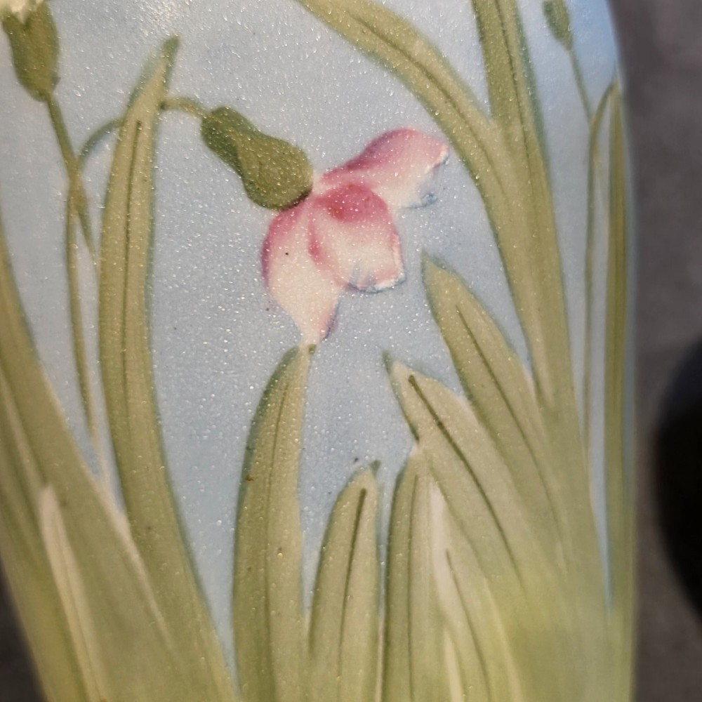 A pair of baluster-shaped porcelain vases featuring hand-painted daffodil and blossom motifs over a light blue and yellow gradient background with small gilded handles. View VIII