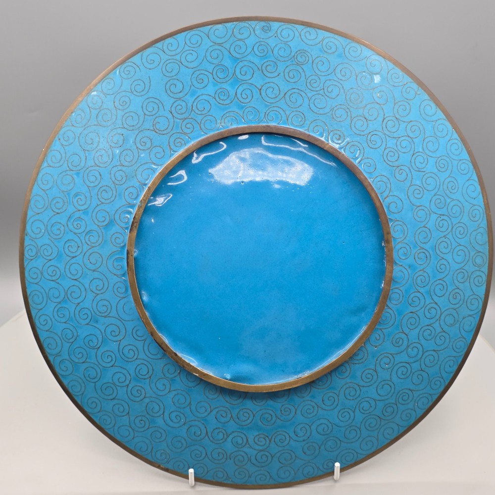 A circular Japanese cloisonne enamel charger depicting three wild geese amidst chrysanthemums against a vivid turquoise background. View VII