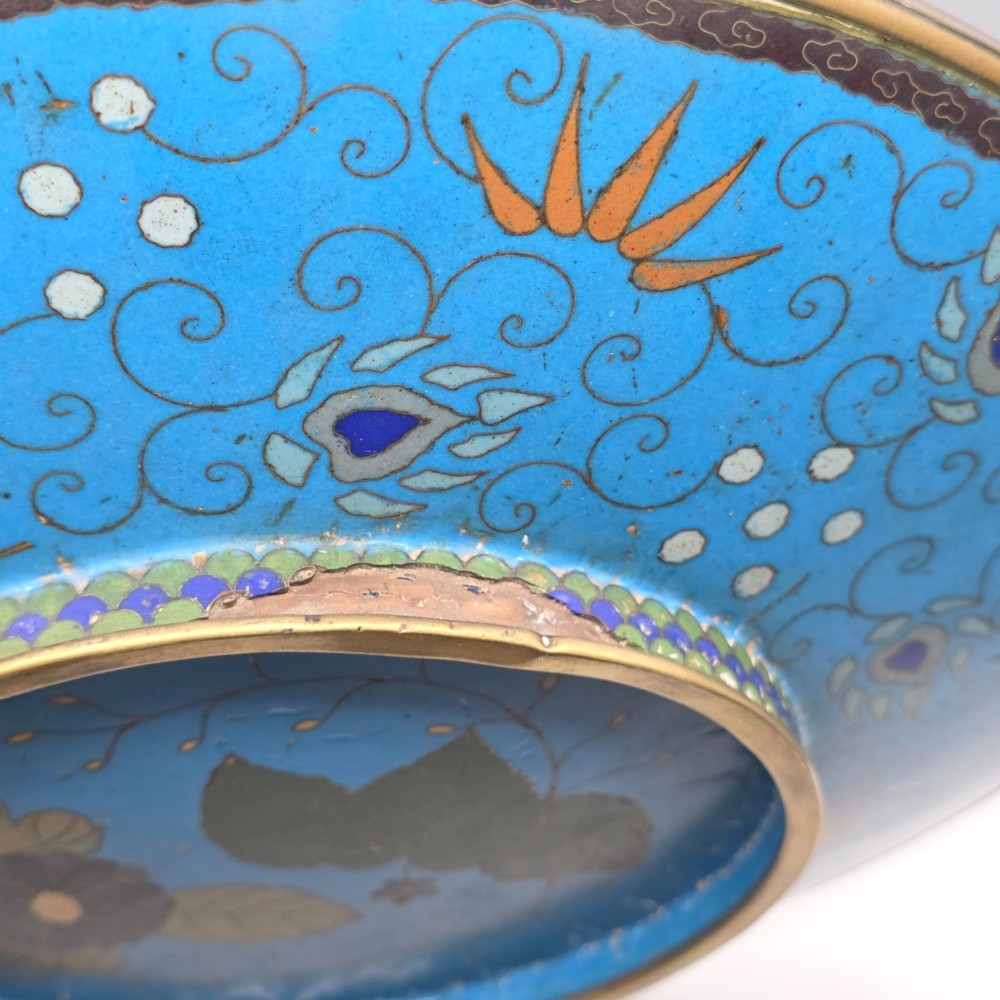 A circular Japanese Meiji period cloisonne enamel charger depicting birds perched on branches with flowers against a bright blue background. View XIV