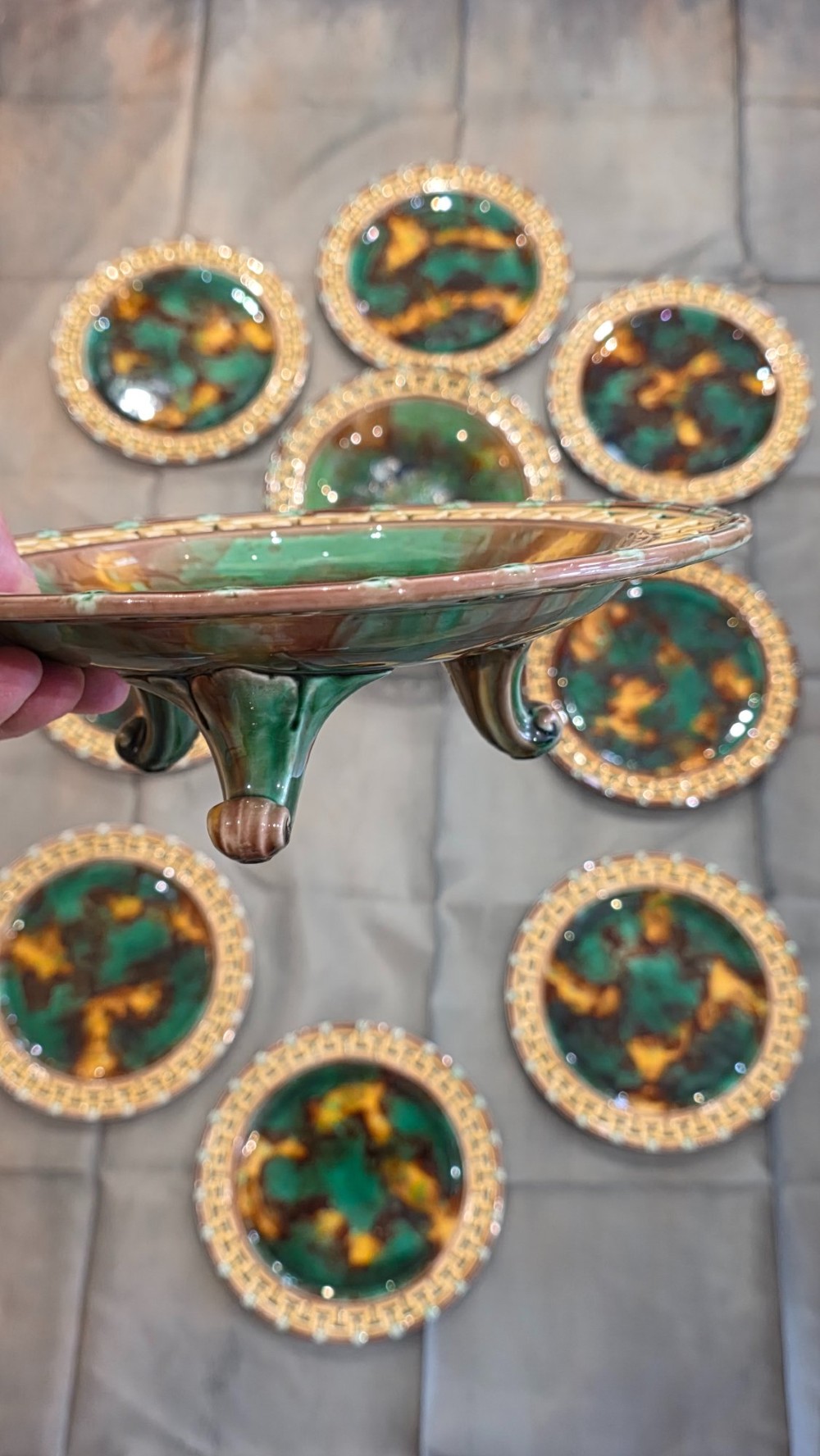 A ten-piece nineteenth-century Wedgwood majolica dessert service featuring green and brown mottled glazes surrounded by classical Greek key pattern borders. View VIII