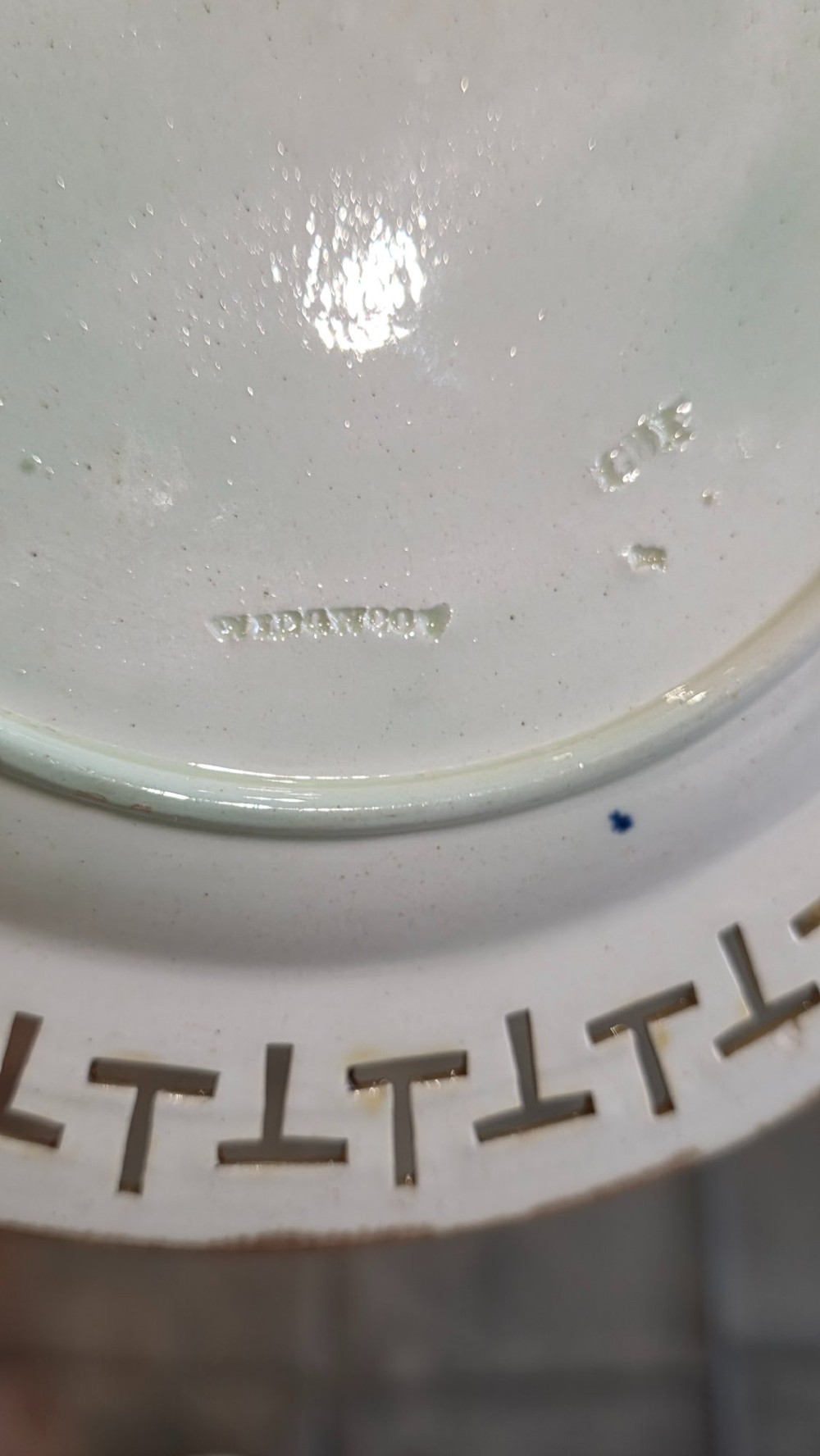 A ten-piece nineteenth-century Wedgwood majolica dessert service featuring green and brown mottled glazes surrounded by classical Greek key pattern borders. View XI