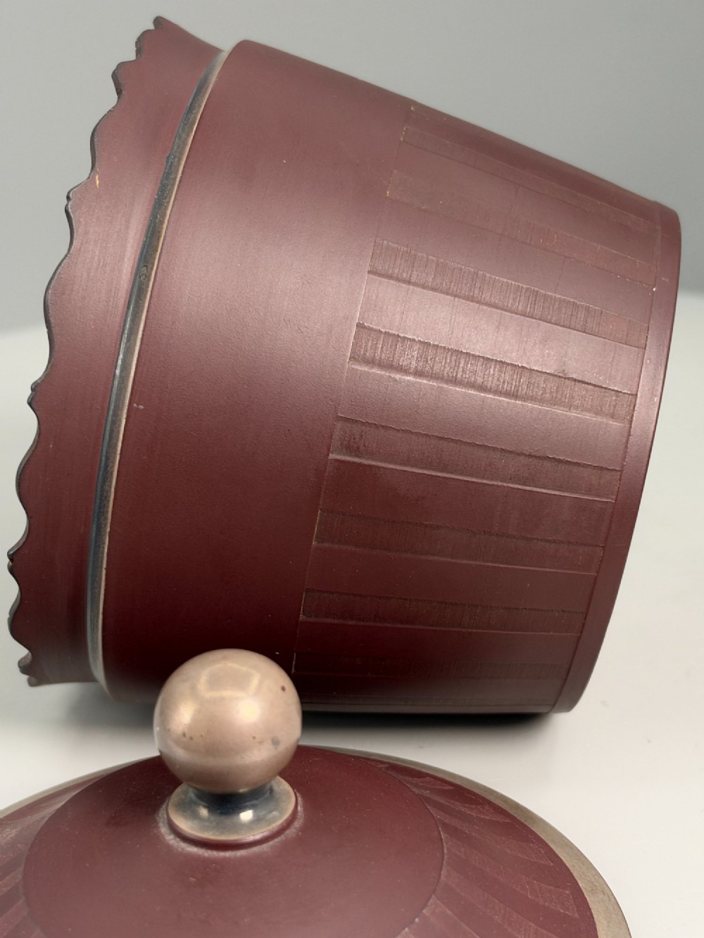 An 18th-century terracotta-coloured red stoneware sugar basin and lid with engine-turned vertical fluting and a metal ball finial. View XI
