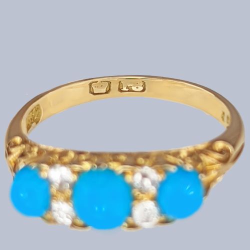 fig 8. An 18ct yellow gold late Victorian ring featuring three dome-shaped blue turquoise cabochons accented by small old cut diamonds set within a carved scrollwork gallery.