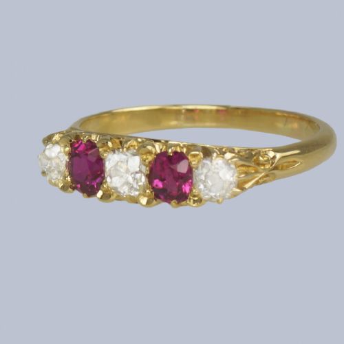 fig 6. An 18ct yellow gold late Victorian five-stone ring featuring alternating oval rubies and old mine cut diamonds set in a claw gallery.